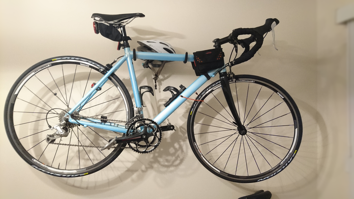 Light blue road bicycle with drop bars